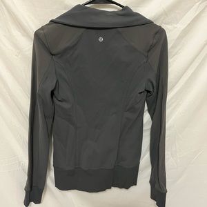 Lululemon zip up. Size 4. Zipper pockets. Tight fitting.